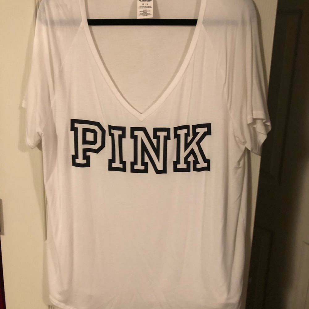 NEW V.S. Pink top! no flaws, stains, or damage.